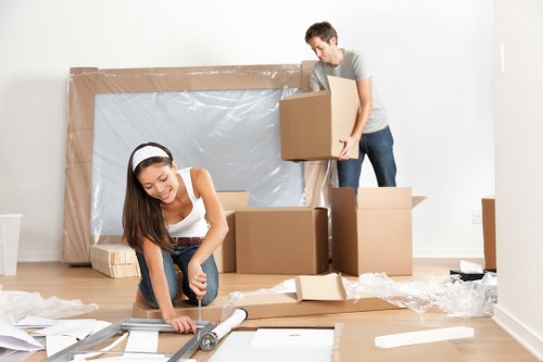 Man and van removal service loading furniture in Wandsworth