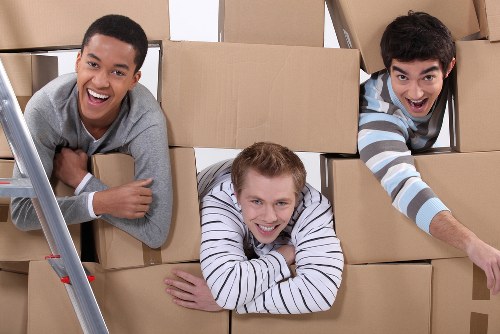 Packed boxes and furniture ready for relocation
