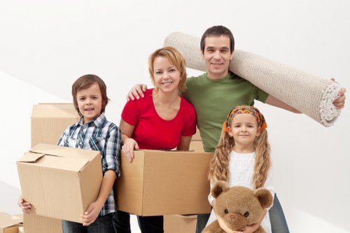 Local moving team organising labelled boxes for a Wandsworth relocation