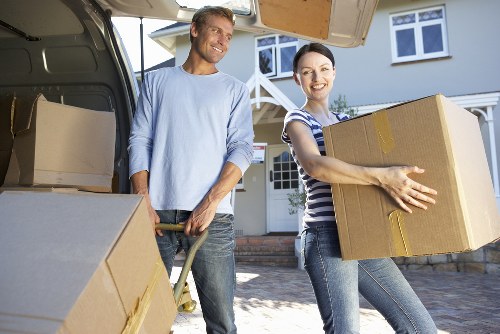 Furniture and reusable household items prepared for charity donation during a removal